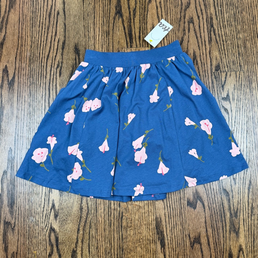 NWT: Tea Collection blue skirt with pink flowers, shorts liner, size 8